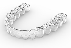 Single Invisalign tray on a white background