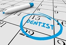 Calendar with reminder to vising McMinnville emergency dentist for checkup